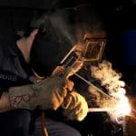 man welding