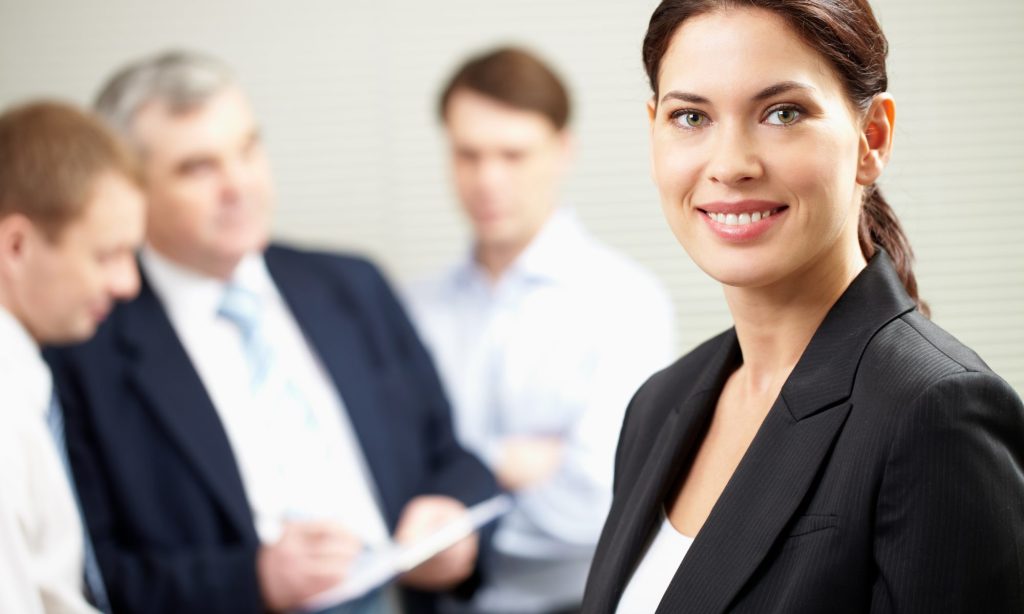 A portrait of a happy PR Relation Manager